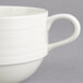 A close-up of a white Oneida Manhattan porcelain cup with a handle.