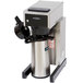A Bloomfield commercial pourover coffee maker with a stainless steel base and a black lid.