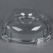 A clear bowl with a clear lid and a hole in the center.