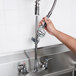 T&S B-0133 EasyInstall Wall Mounted 34 1/2" High Pre-Rinse Faucet with Adjustable 8" Centers, 1.15 GPM Spray Valve, and 44" Hose Main Thumbnail 1