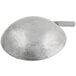 A silver Town carbon steel wok with a handle.