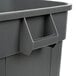 A close up of a gray Continental Huskee square trash can with a handle.