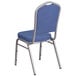 A Flash Furniture blue fabric banquet chair with a silver metal frame and crown back.