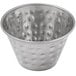 A silver hammered stainless steel round sauce cup.