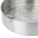 A Monix stainless steel steamer basket with holes in it.