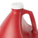 A red jug of Wright's Hickory Liquid Smoke with a white cap.