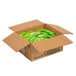 A cardboard box filled with green Pure Via stevia packets.