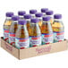 A close-up of a group of Nantucket Nectars Pressed Orchard Apple Juice bottles in a cardboard box.