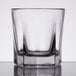 A clear Libbey rocks glass with a short rim.