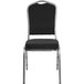 A Flash Furniture black fabric banquet chair with a black and silver frame.