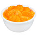 A bowl of Dole mandarin orange slices in light syrup.