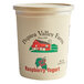 A white Pequea Valley Farm plastic container of raspberry yogurt with a red and white logo.