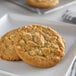 David's Cookies 3 oz. Preformed White Chocolate Macadamia Cookie Dough- 107/Case - 107/Case Main Thumbnail 1