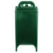 A green plastic container with a handle.