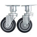 Two Vulcan metal casters with black rubber wheels.