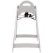 A grey Koala Kare high chair with a black seat and strap.