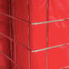 A red nylon delivery bag with a metal wire rack inside.