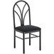 A Lancaster Table & Seating black chair with black fabric seat and back.