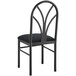A Lancaster Table & Seating black metal chair with black fabric seat.