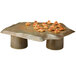 A GET stone-mel melamine display tray with small sandwiches on a table with food.