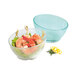 A jade polycarbonate bowl with shrimp and lettuce in it.
