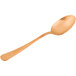 A Mercer Culinary rose gold plating spoon with a copper handle.