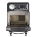 A black and silver TurboChef Sota high-speed countertop oven with a metal tray on top.