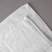An Oxford Vicenza Bianco white bath towel with a dobby border.