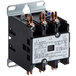 A black and white Cooking Performance Group AC contactor.