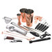 A Barfly copper-plated bartender kit on a counter with copper and black tools.
