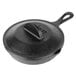 A Lodge mini cast iron skillet with a lid.
