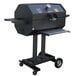 A black R & V Works Smokin' Cajun charcoal grill on wheels.