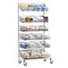 A Metro qwikSIGHT metal rack with six basket shelves holding medical supplies.