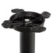 A black Lancaster Table & Seating cast iron bar height table base with a screw top.