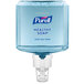 A white plastic container of Purell Healthy Soap with a blue label and blue button.
