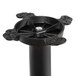 A black metal Lancaster Table & Seating bar height table base with a bolt.