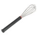 A Matfer Bourgeat wire whisk with a black Exoglass handle.