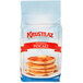 A Krusteaz 5 lb. bag of pancake mix on a white background.