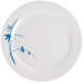 A white plate with a blue bamboo design on it.