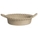 A G.E.T. Enterprises sand granite deep Mexican cazuela bowl with a handle on a white background.