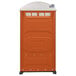 A PolyJohn portable toilet with a white base and orange lid.