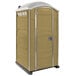 A brown PolyJohn portable restroom with a white roof.