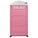 A pink PolyJohn portable toilet with a translucent top and white trim.