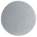 A white round disc with black specks.
