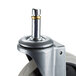A Cambro metal swivel caster wheel with a screw.