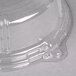 A clear plastic container with a WNA Comet lid on top.