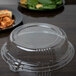 A clear plastic container with a WNA Comet 7" PET lid on it.