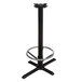 A Lancaster Table & Seating black cast iron bar height table base with metal foot ring.