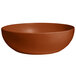 A brown G.E.T. Enterprises brick resin-coated aluminum bowl.
