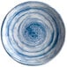 A blue and white Elite Global Solutions Van Gogh melamine plate with swirls.
